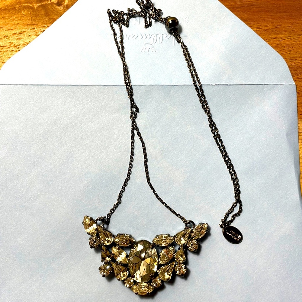 Juicy Couture necklace. The size is adjustable. New. Never worn.